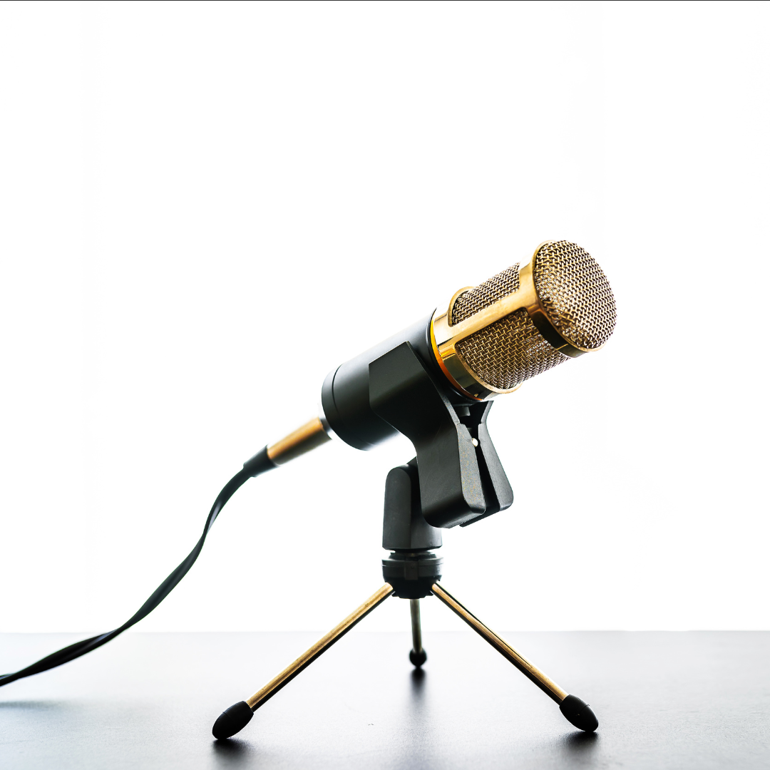 mic against a white background to signify our interview with BigCommerce website designers