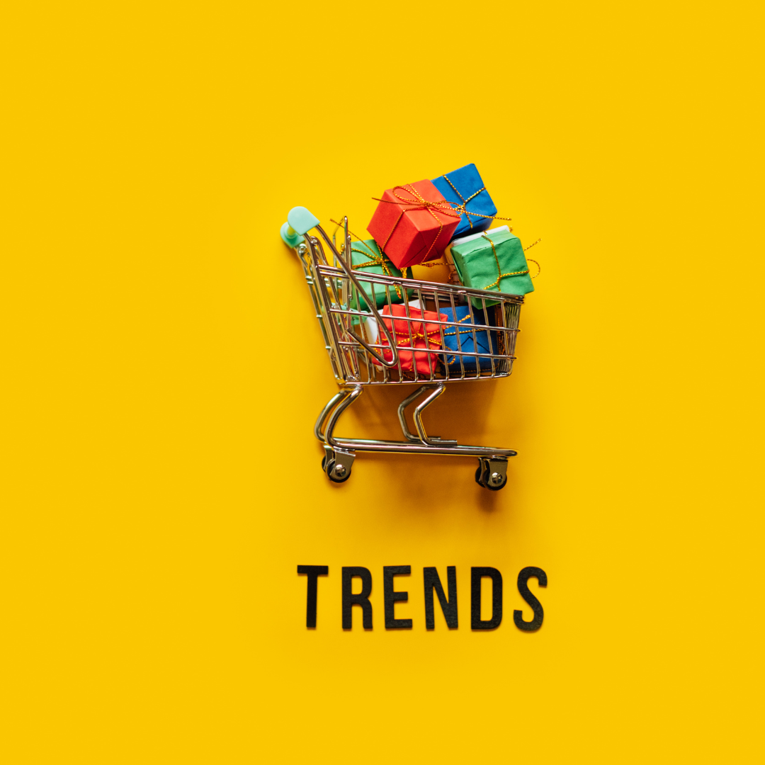 concept of ecommerce trends for Bigcommerce website design. image of a shopping cart full of products against a yellow background